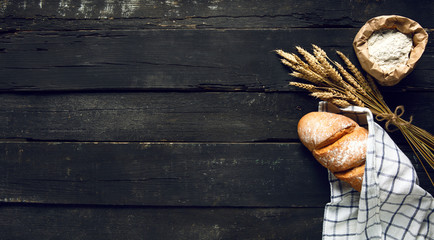 Still life with bread, flour and spikelets