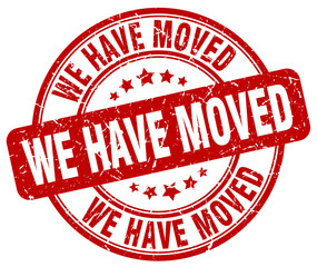 we have moved red grunge round vintage rubber stamp