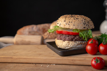 Hamburger homemade on wood table.