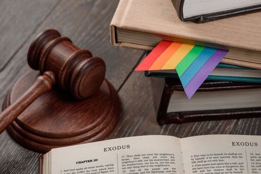 Judge's gavel, book and rainbow