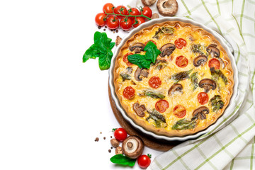 Baked homemade quiche pie in ceramic baking form