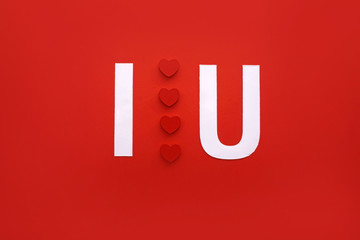 Valentines day red background with red heart, inscription I love you