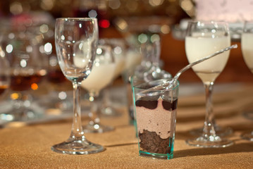 Glass glasses with colored drinks on the table. alcoholic drinks at the buffet