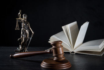 Symbols of law on dark background