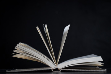 Open Law Book on dark background