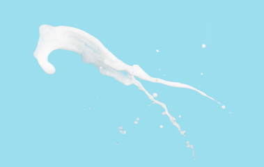 White bubble foam splash explosion in the air isolated on blue background,freeze stop motion photo...