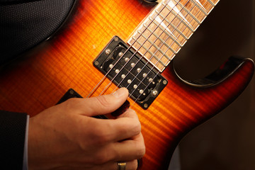 Naklejka premium hand with guitar