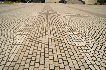 concrete stone paving patterns with sunlight
