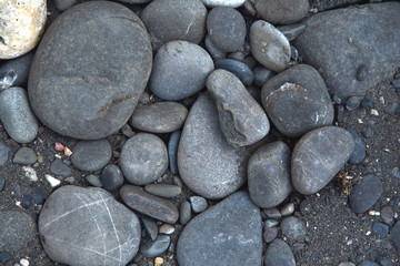 interesting background of large gray cobblestones, river stone
