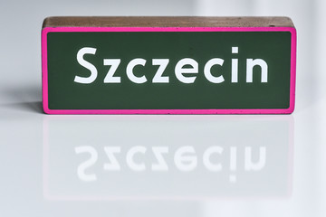 Szczecin sign on a concrete plate.