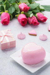 Pink heart shaped mousse cake for a romantic dessert.