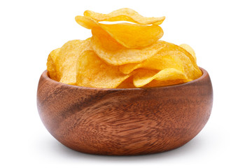 Delicious potato chips in a wooden bowl, isolated on white background