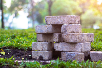  Pavement bricks and paving slabs on the grass in the grass