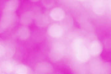 pink and purple bokeh lights background, colorful glitter defocused.