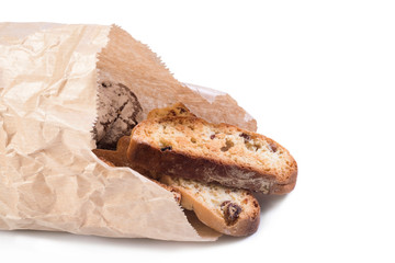 Paper package of home-made pastries on the isolated background