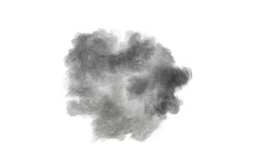 Black powder explosion against white background. Black dust particles splashing.