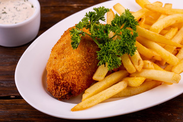 French fries with cutlet breaded
