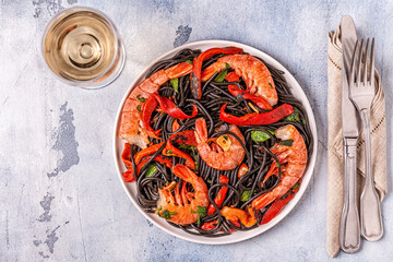 Black spaghetti with prawns and vegetables