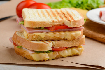 Sandwiches with ham, lettuce, tomato