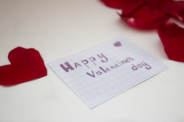 happy Valentine's day greetings on white background and red heart