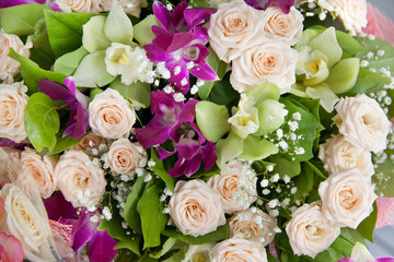 Bouquet of roses and orchids.