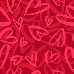 Seamless romantic pattern with hand drawn red hearts. Colorful doodle hearts on red background. Ready template for design, postcards, print, poster, party, Valentine's day, vintage textile. Vector.