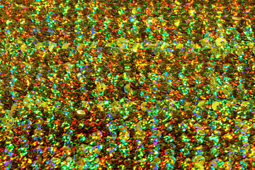 Fototapeta na wymiar Holographic iridescent round confetti and tinsel background