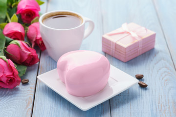 Valentine's day with heart shaped mousse cakes, coffee, gift box