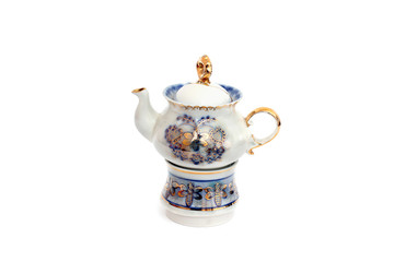 Porcelain teapot on a white background