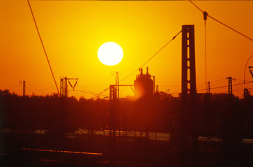 Urban skyline railroad track Munich by sundawn.