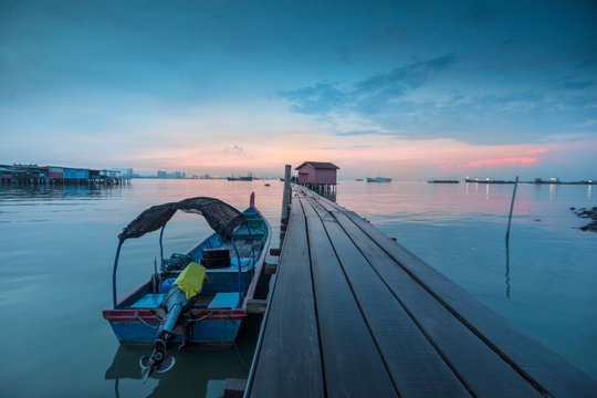 view of penang georgetown bridge at sunset