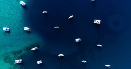 boat in a lagoon in aerial view, Papeete French Polynesia