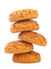 Fototapeta na wymiar Stack of oatmeal cookies isolated on white background