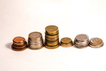 stack of coins isolated on white background