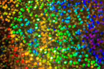Bokeh, colorful abstract background. Glare of many lights out of focus. defocused back