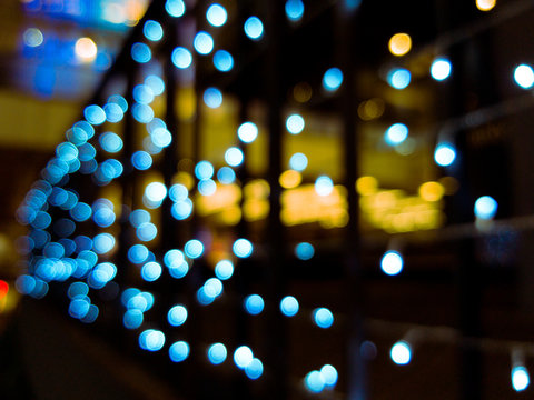 Blurred background of street bar night with light bokeh abstract