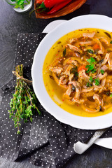 Traditional tripe soup in polish style with beef and vegetables