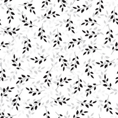 Fototapeta na wymiar Illustration of sprigs arranged irregularly in shades of black and gray. Stylish repeating graphic pattern with plant silhouettes. Vector seamless pattern great for fabric. Surface repeat design.