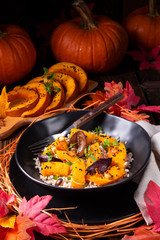 gratinated vegetarian pumpkin with barley groats, plums and thyme