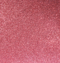 Fototapeta premium red background with plenty of glittering luminous glitter
