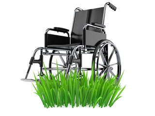 Fototapeta na wymiar Wheelchair on grass