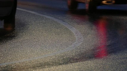 Rain wet road, lights, directional arrows in the rain at dusk, Bremen, Germany, Europe