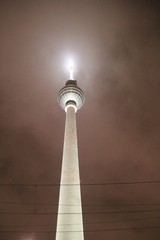 The Berlin television tower in the mist, in evening light. Germany, Europe.