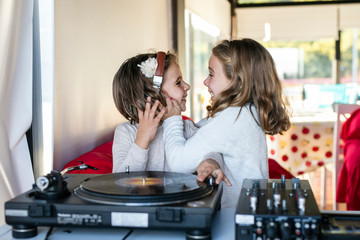 Little kids get a party with vinyl records