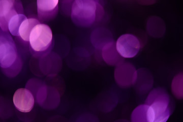 Bokeh. Holiday background. Christmas lights. Glitter. Defocused sparkles. New Year backdrop....