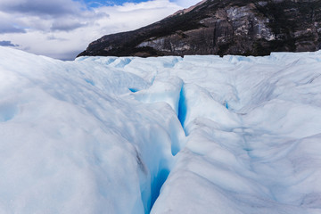 Fototapeta na wymiar Beautiful white and blue glacier of Perito Moreno in Argentina