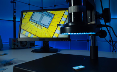 Laboratory of semiconductor chips. The development of modern electronics. crystal chip in the...