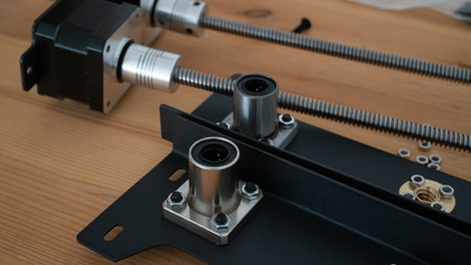 Stepper motors and ball screws