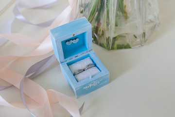 Wedding rings in white gold in a box.
