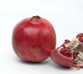 Fresh and juicy granate on white background. Organic food